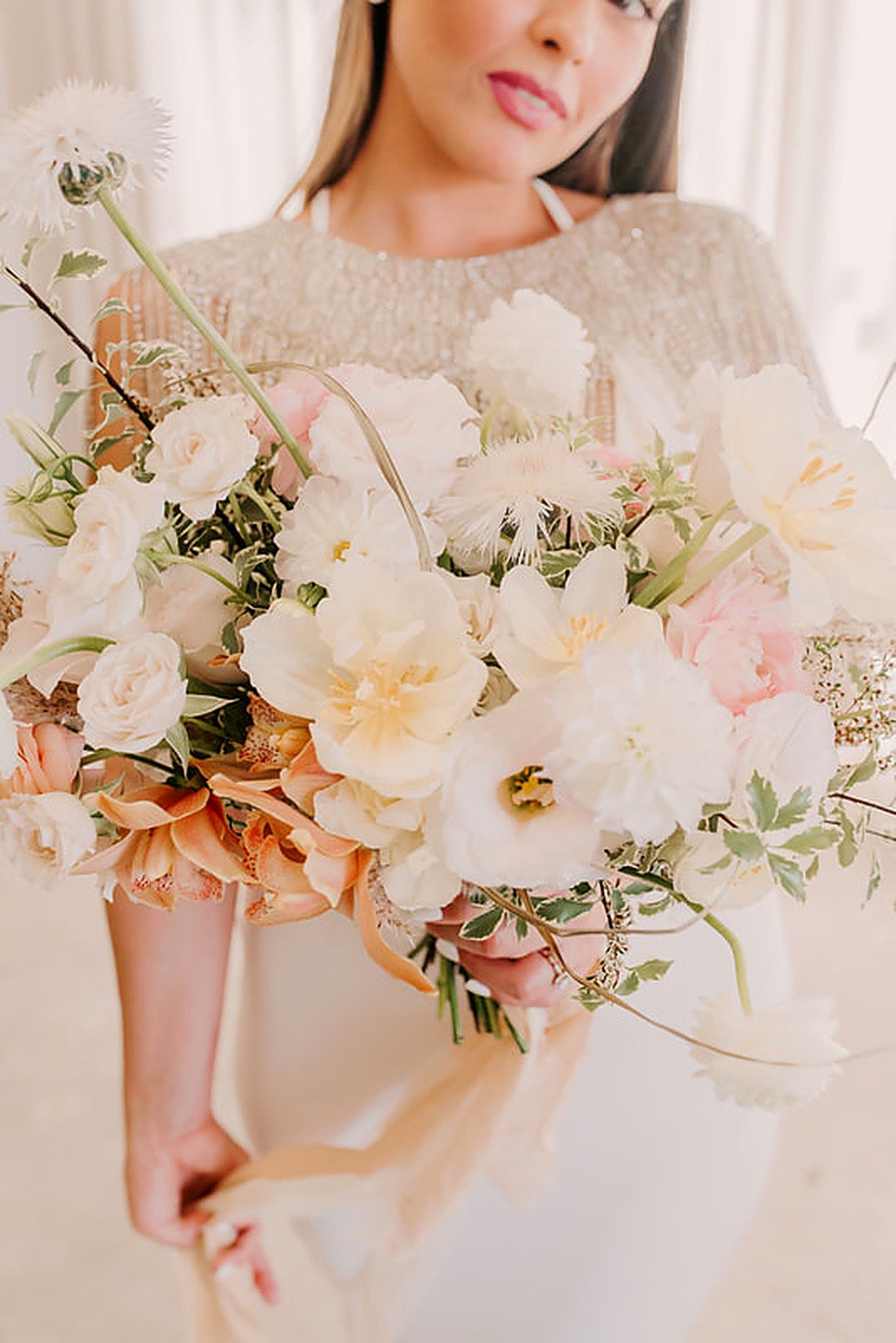 Bridal bouquet & handheld florals